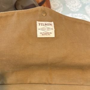 A very nice Filson computer bag. The bag was purchased and has limited use.